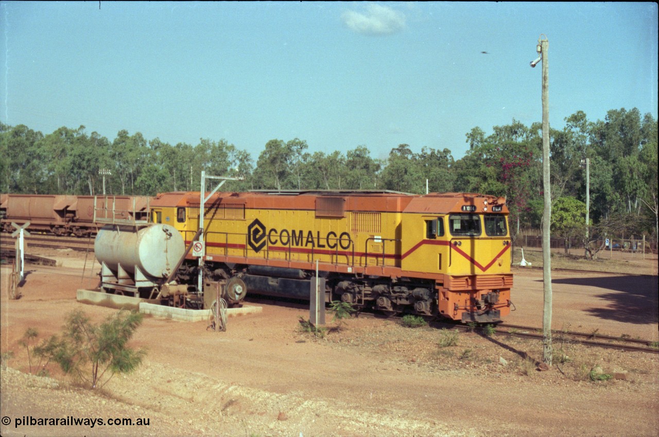 213-25
Weipa, Lorim Point fuel point, Comalco R 1004 loco Clyde Engineering built EMD model JT42C built 1990 serial 90-1277, weight 132 tonne, engine 12-710G3A, generator AR11-WBA-CA5, traction motors D87ETR, rated power 2460 kW/3300 hp. The body is similar to a V/Line N class while the components are the same as the Australian National AN class. Originally built for Goldsworthy Mining as GML 10 for use at their Western Australian iron ore railway and locally known as Cinderella. Purchased by Comalco in 1994 following the takeover of Goldsworthy by BHP.
Keywords: R1004;Clyde-Engineering-Kelso-NSW;EMD;JT26C;90-1277;Comalco;GML10;Cinderella;GML-class;