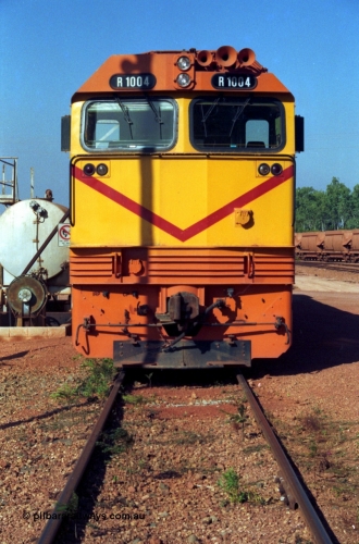213-23
Weipa, Lorim Point fuel point, Comalco R 1004 loco Clyde Engineering built EMD model JT42C built 1990 serial 90-1277, weight 132 tonne, engine 12-710G3A, generator AR11-WBA-CA5, traction motors D87ETR, rated power 2460 kW/3300 hp. The body is similar to a V/Line N class while the components are the same as the Australian National AN class. Originally built for Goldsworthy Mining as GML 10 for use at their Western Australian iron ore railway and locally known as Cinderella. Purchased by Comalco in 1994 following the takeover of Goldsworthy by BHP.
Keywords: R1004;Clyde-Engineering-Kelso-NSW;EMD;JT26C;90-1277;Comalco;GML10;Cinderella;GML-class;