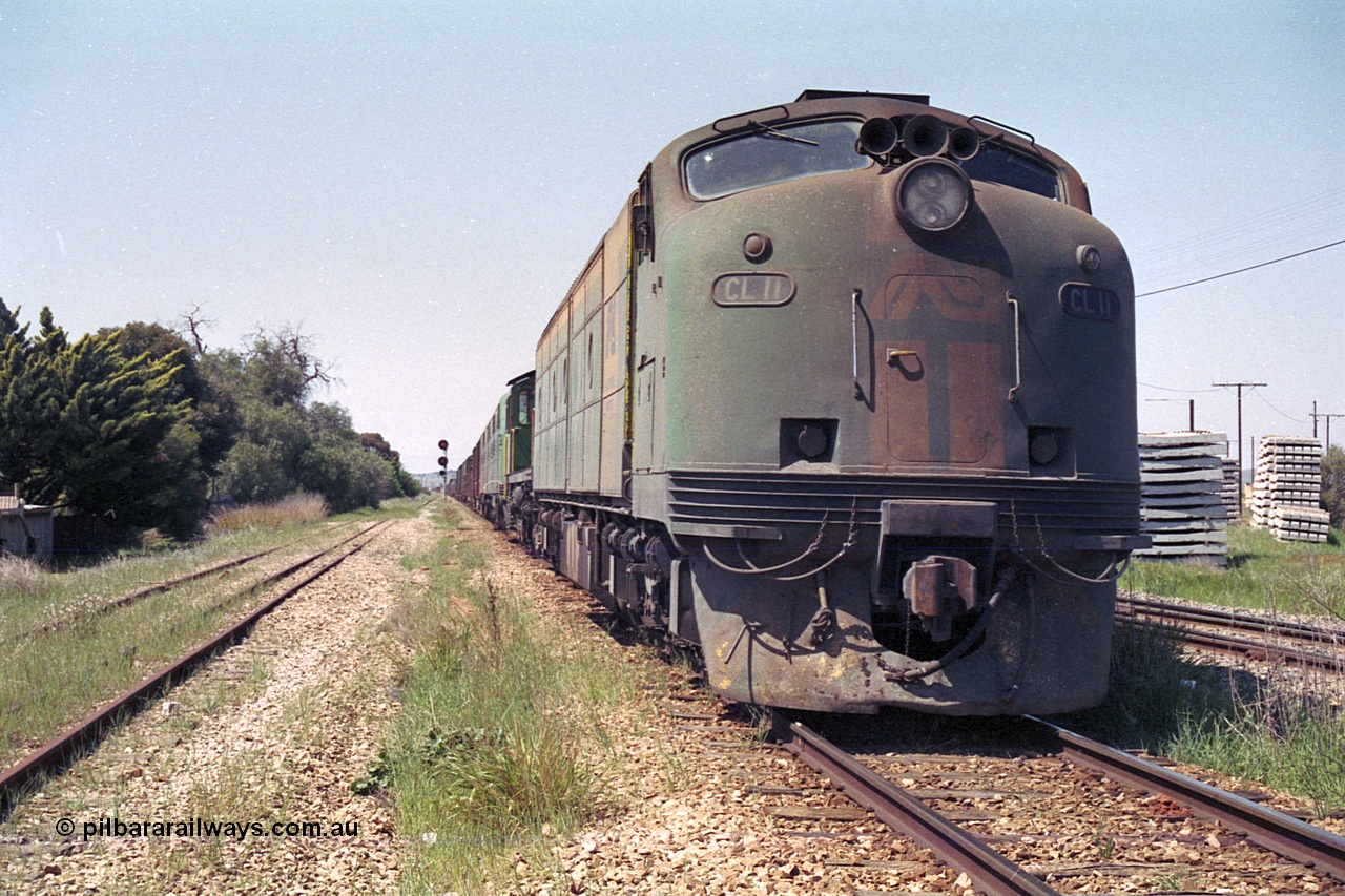 215-07
Peterborough, an SP service awaits line clear behind the AN liveried quad combination of Clyde Engineering EMD model AT26C CL class Bulldog CL 11 serial 71-739 which in later life became CLF 2, ALCo model DL541 600 class 605 serial G6015/04 which went on to become BU 1, and EMD model A16C GM class Bulldogs units GM 43 serial 67-529 and GM 46 serial 67-532.
Keywords: CL-class;600-class;GM-class;CL11;605;GM43;GM46;bulldog;AT26C;DL541;71-739;G6015-4;AE-Goodwin;ALCo;EMD;Clyde-Engineering-Granville-NSW;A16C;67-529;67-532;