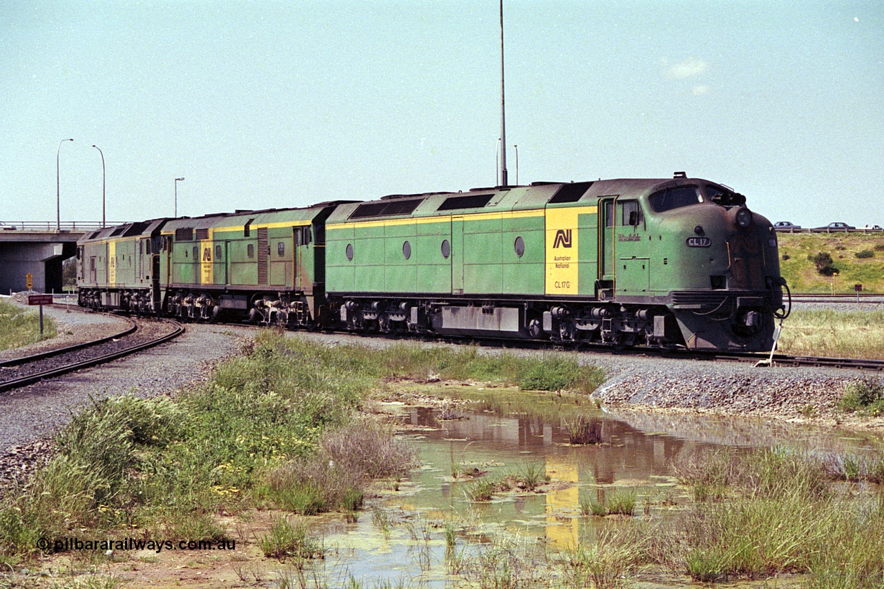 215-16
Dry Creek Motive Power Centre, Australian National trio of standard gauge light engines wearing the AN livery with the final Clyde Engineering EMD model AT26C Bulldog ever built CL class CL 17 'William McMahon' serial 71-757 leading an ALCo 700 class and a Clyde Engineering EMD BL class.
Keywords: CL-class;CL17;bulldog;Clyde-Engineering-Granville-NSW;EMD;AT26C;71-757;