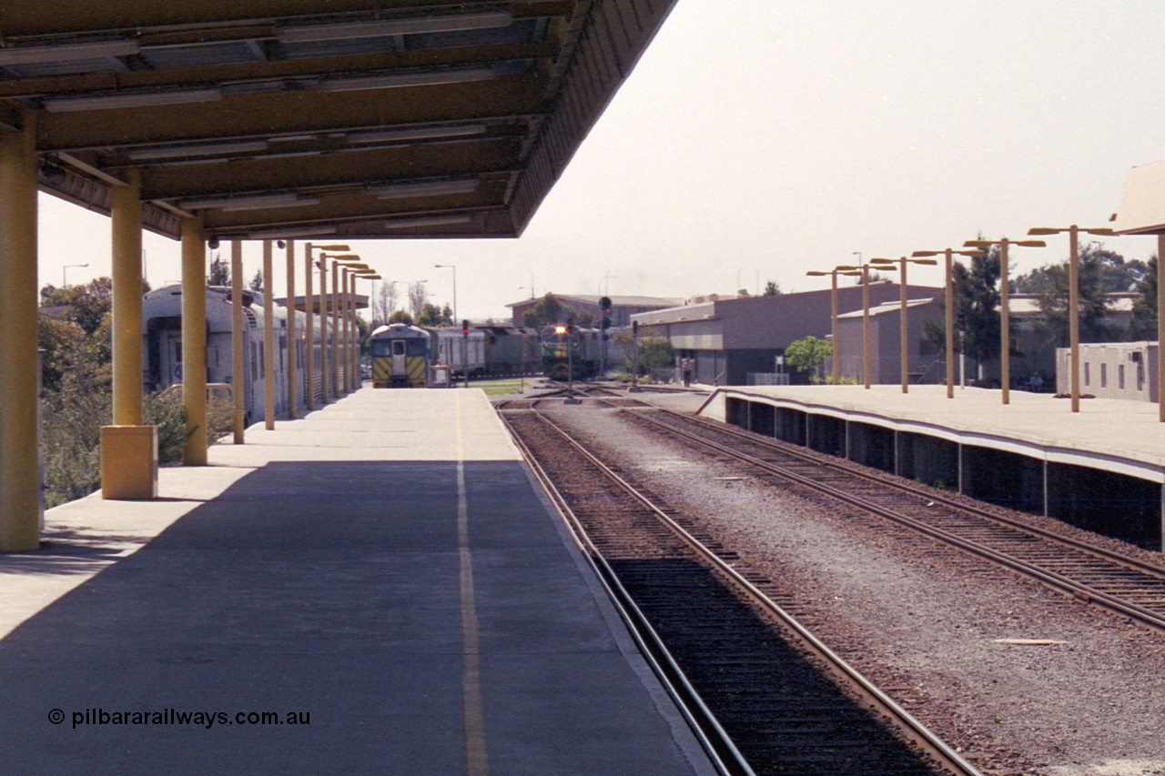 215-27
Keswick, the Australian National Adelaide interstate passenger terminal with the Indian Pacific arriving behind an EL class, DL class in the distance.
