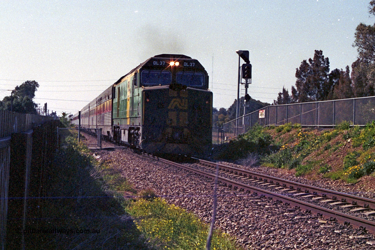 215-33
Dudley Park, the south bound Ghan rolls past on the way to Keswick Terminal behind AN livered DL class DL 37 Clyde Engineering EMD model AT42C serial 88-1245.
Keywords: DL-class;DL37;Clyde-Engineering-Kelso-NSW;EMD;AT42C;88-1245;