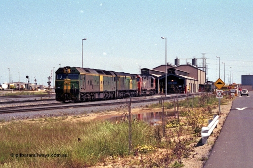 215-19
Dry Creek Motive Power Centre, fuel point roads, AN BL class BL 31 Clyde Engineering EMD model JT26C-2SS serial 83-1015 with 700 class 704 AE Goodwin ALCo model DL500G serial G6059-2 rest between jobs with V/Line broad gauge N class behind them.
Keywords: BL-class;BL31;Clyde-Engineering-Rosewater-SA;EMD;JT26C-2SS;83-1015;