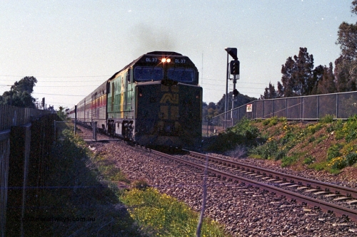 215-33
Dudley Park, the south bound Ghan rolls past on the way to Keswick Terminal behind AN livered DL class DL 37 Clyde Engineering EMD model AT42C serial 88-1245.
Keywords: DL-class;DL37;Clyde-Engineering-Kelso-NSW;EMD;AT42C;88-1245;