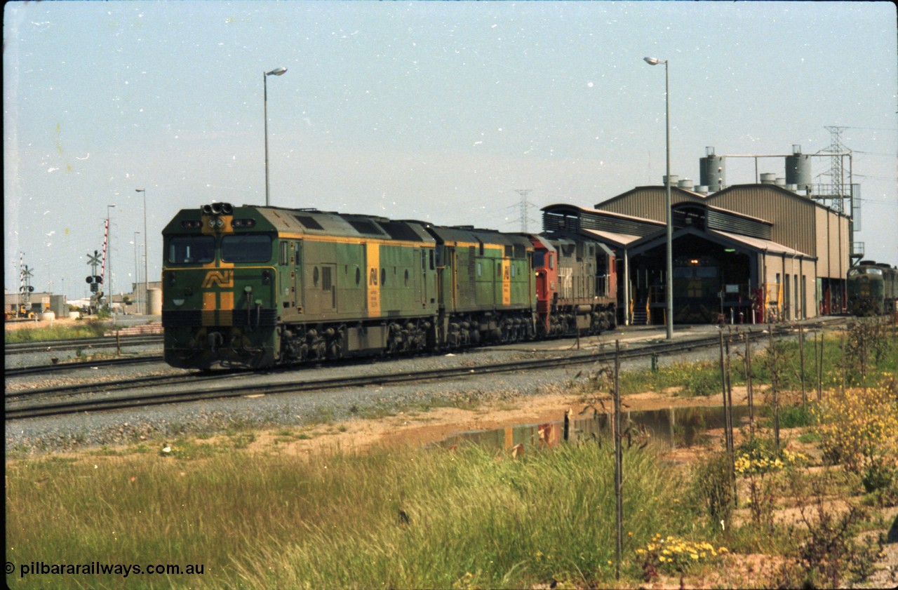 216-10
Dry Creek Motive Power Centre, fuel point roads, AN BL class BL 31 Clyde Engineering EMD model JT26C-2SS serial 83-1015 with 700 class 704 AE Goodwin ALCo model DL500G serial G6059-2 rest between jobs with V/Line broad gauge N class behind them.
Keywords: BL-class;BL31;Clyde-Engineering-Rosewater-SA;EMD;JT26C-2SS;83-1015;