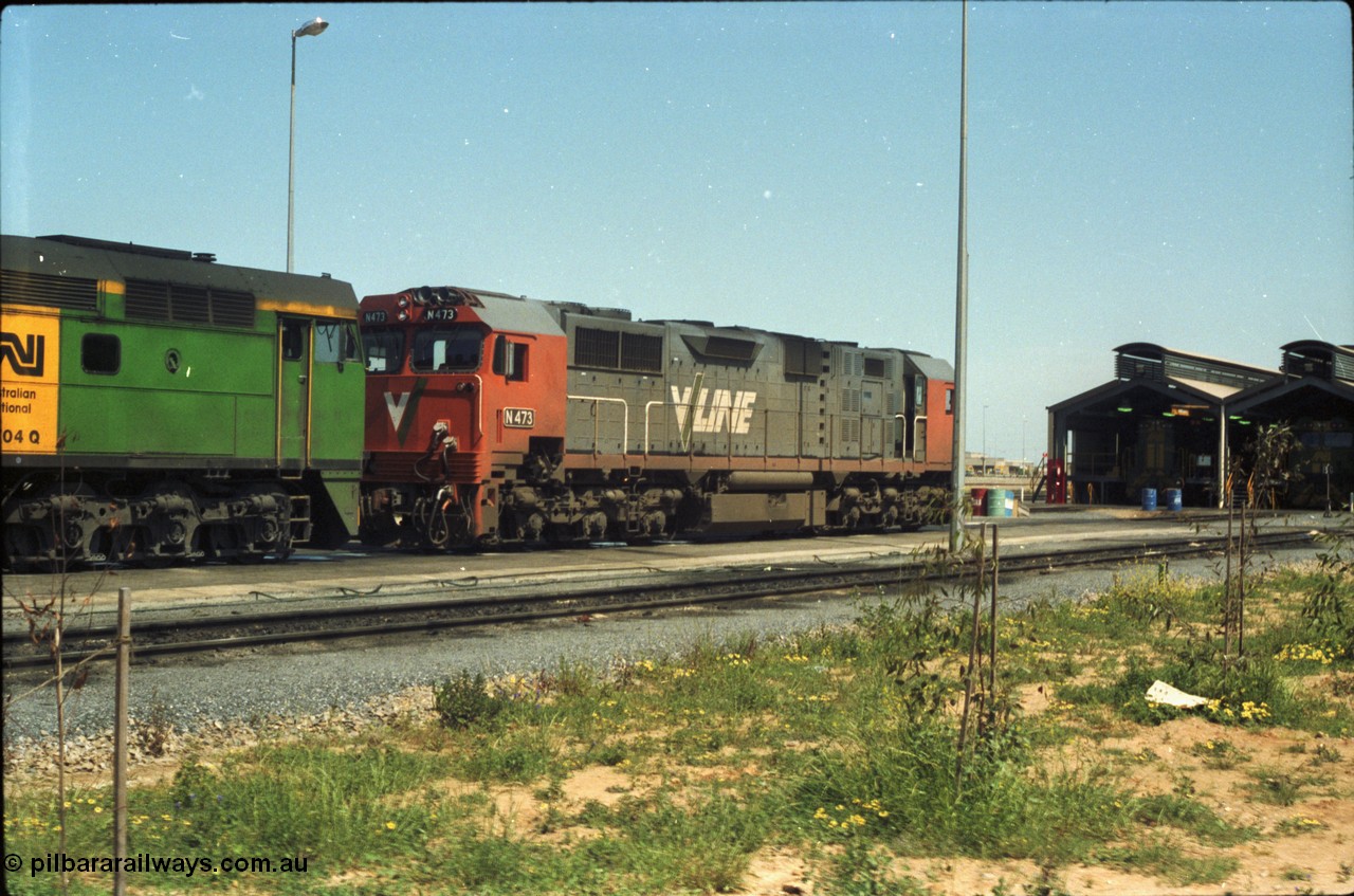 216-15
Dry Creek Motive Power Centre, fuel point roads sees V/Line broad gauge N class locomotive N 473 Clyde Engineering EMD model JT22HC-2 serial 87-1202, resting after running the overnight passenger train 'The Overland' from Melbourne, and will return with the Melbourne bound service in the early evening.
Keywords: N-class;N473;Clyde-Engineering-Somerton-Victoria;EMD;JT22HC-2;87-1202;