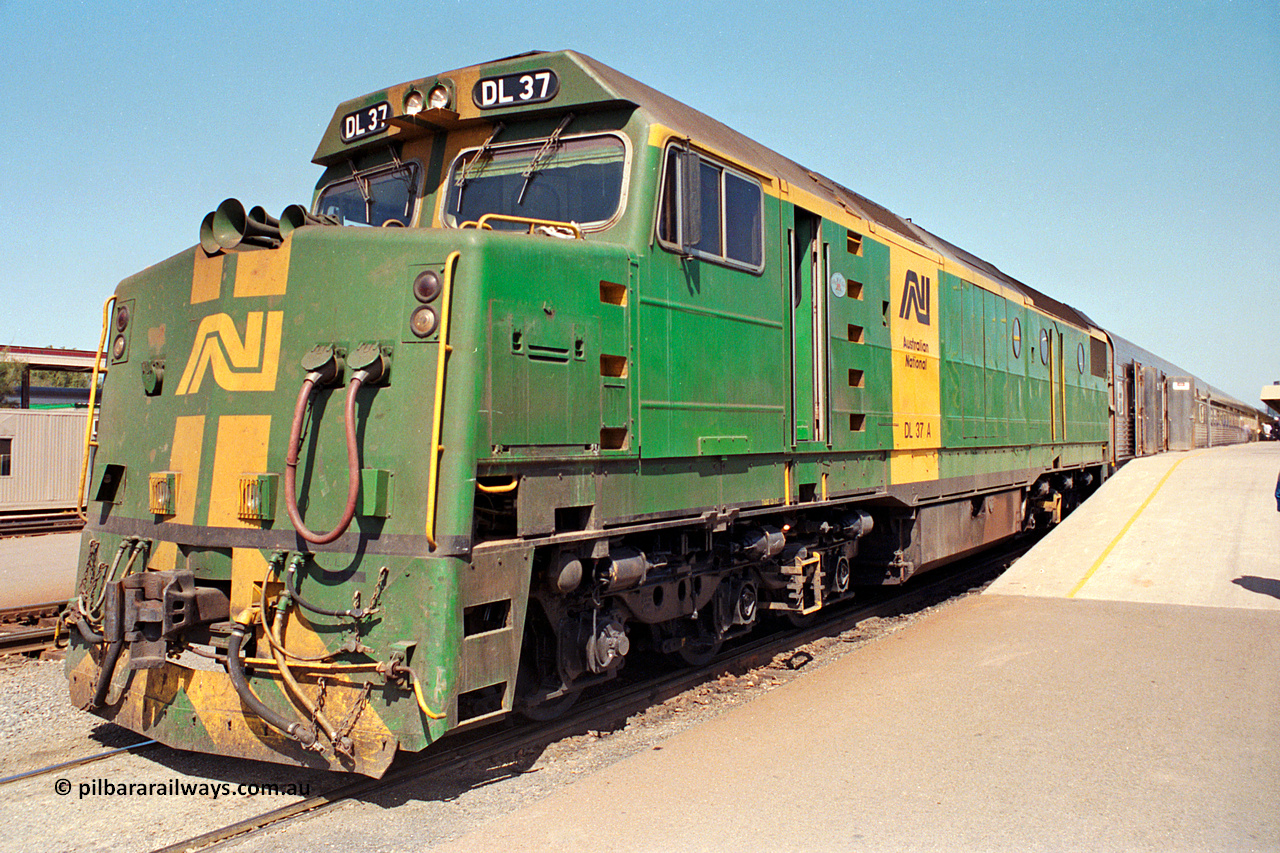 217-03
Keswick Passenger Terminal, Australian National DL class locomotive DL 37 Clyde Engineering EMD model AT42C serial 88-1245 on the pointy end of 'The Ghan' as departure time approaches.
Keywords: DL-class;DL37;Clyde-Engineering-Kelso-NSW;EMD;AT42C;88-1245;