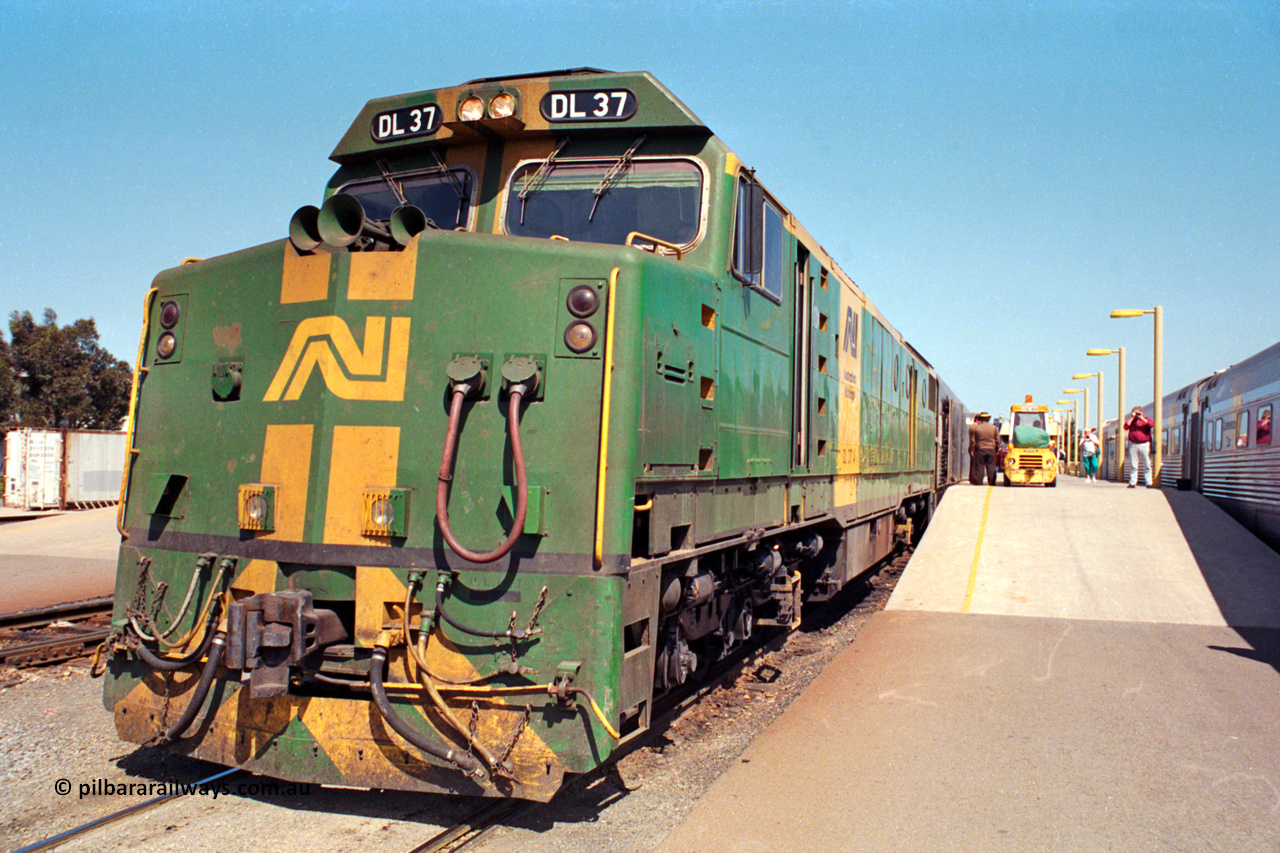 217-07
Keswick Passenger Terminal, Australian National DL class locomotive DL 37 Clyde Engineering EMD model AT42C serial 88-1245 on the pointy end of 'The Ghan' as departure time approaches.
Keywords: DL-class;DL37;Clyde-Engineering-Kelso-NSW;EMD;AT42C;88-1245;