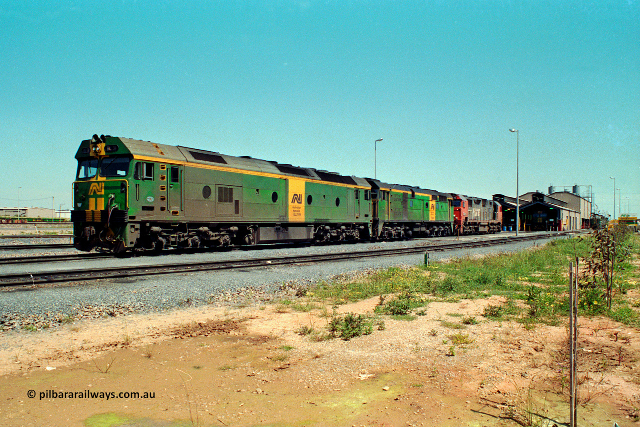 217-21
Dry Creek Motive Power Centre, fuel point roads, AN BL class BL 31 Clyde Engineering EMD model JT26C-2SS serial 83-1015 with 700 class 704 AE Goodwin ALCo model DL500G serial G6059-2 rest between jobs with V/Line broad gauge N class behind them.
Keywords: BL-class;BL31;Clyde-Engineering-Rosewater-SA;EMD;JT26C-2SS;83-1015;