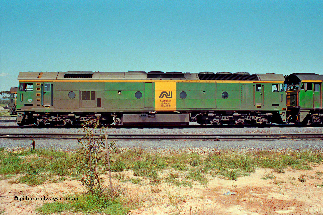 217-22
Dry Creek Motive Power Centre, fuel point roads, AN BL class BL 31 Clyde Engineering EMD model JT26C-2SS serial 83-1015, side view.
Keywords: BL-class;BL31;Clyde-Engineering-Rosewater-SA;EMD;JT26C-2SS;83-1015;