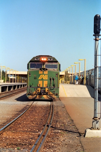 217-04
Keswick Passenger Terminal, Australian National DL class locomotive DL 37 Clyde Engineering EMD model AT42C serial 88-1245 on the pointy end of 'The Ghan' as departure time approaches.
Keywords: DL-class;DL37;Clyde-Engineering-Kelso-NSW;EMD;AT42C;88-1245;
