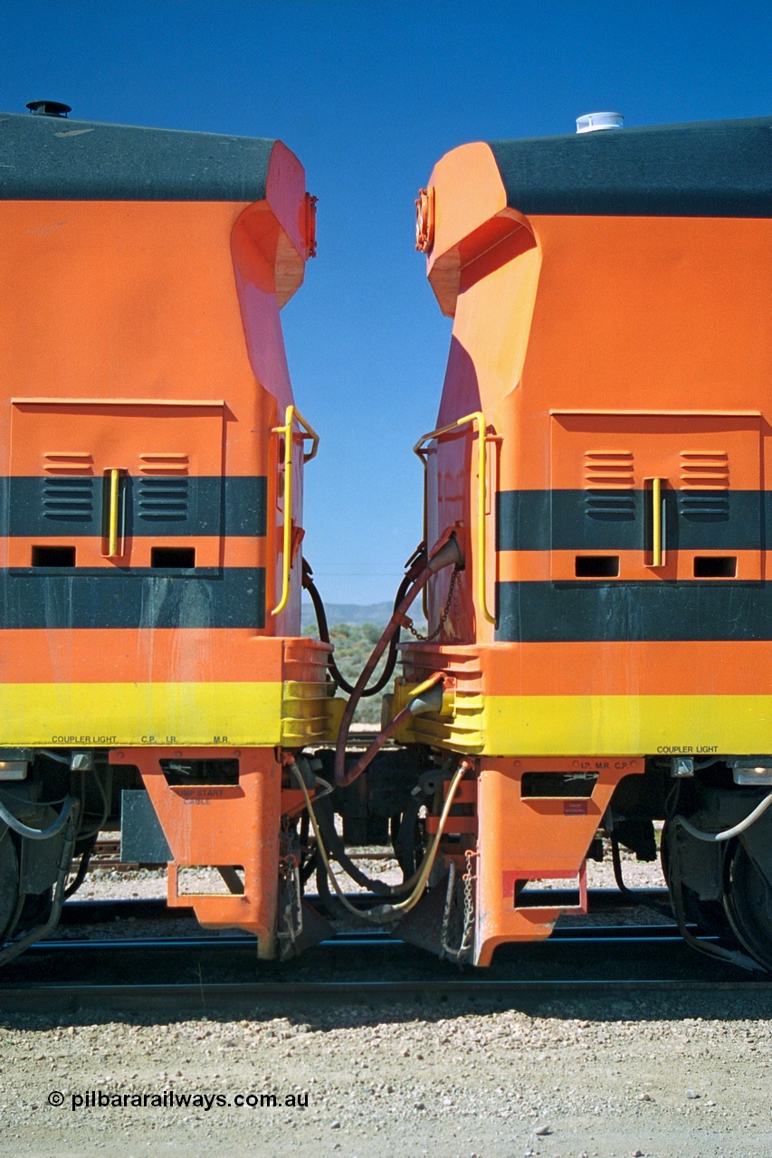 244-09
Port Augusta yard, blanked off cab to cab Morrison Knudsen rebuild units ALF 20 on the left and ALF 18 on the right, model JT26C-2M serials 94-AN-020 and 94-AN-018 in Australian Southern livery, originally AL class AL 24 and 21.
Keywords: ALF-class;ALF18;ALF20;MKA;EMD;JT26C-2M;94-AN-018;94-AN-020;AL-class;