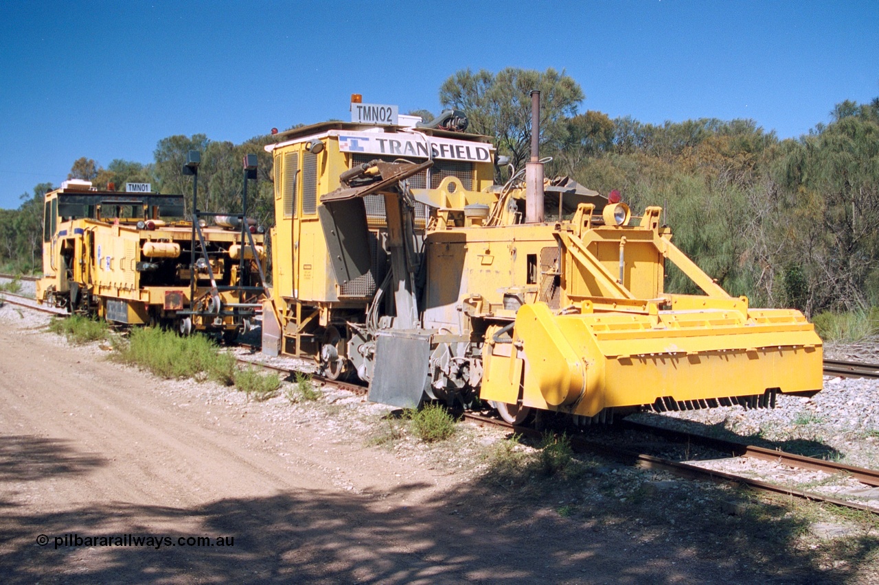 244-17
Coomunga, on the siding, two Transfield track machines, TMN 02, a ballast regulator and TMN 01 a track tamper. 6th April, 2003.
Keywords: track-machine;