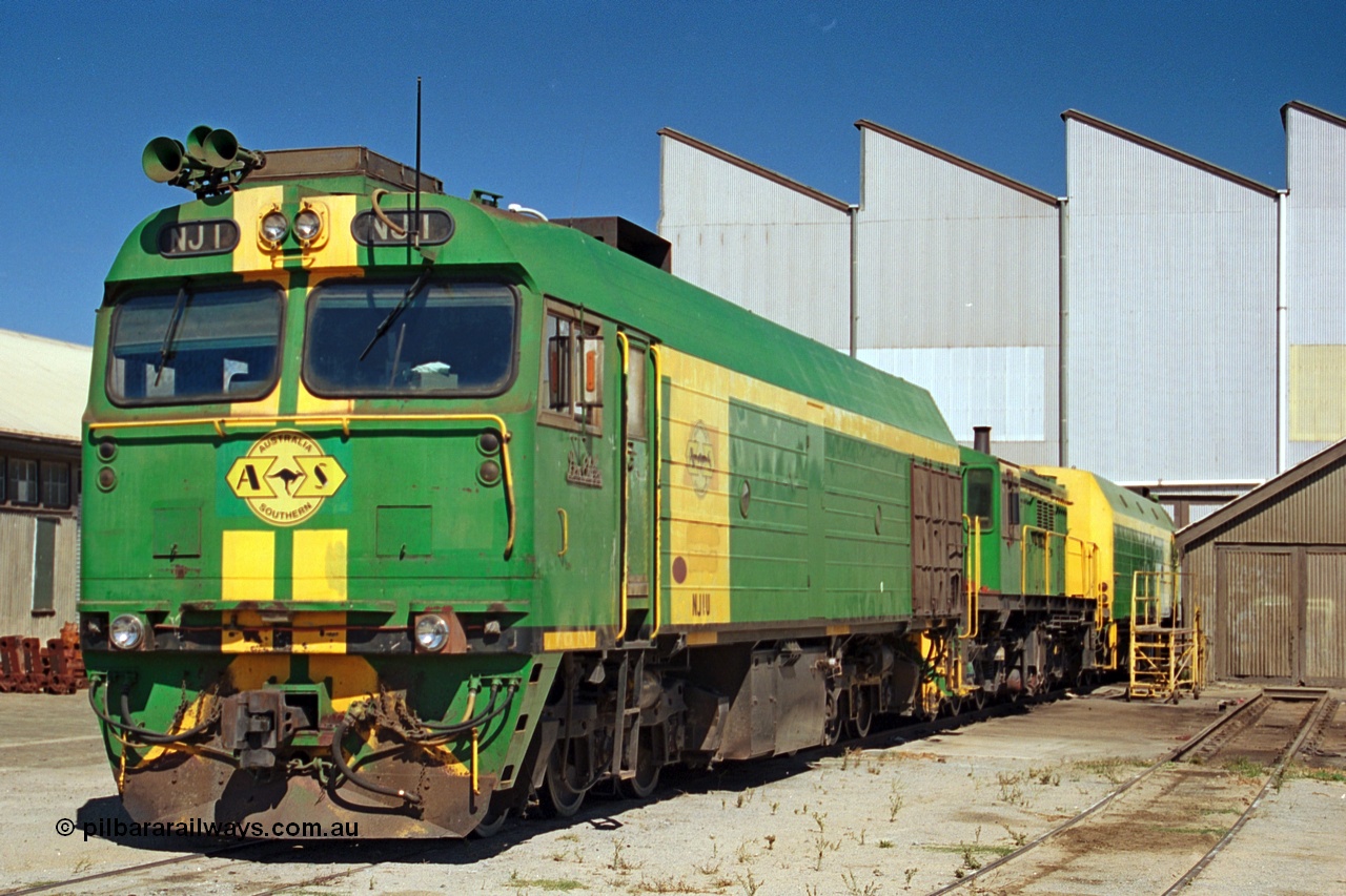 244-20
Port Lincoln loco workshops, still wearing the former owners AN livery, Australian Southern NJ class leader NJ 1 'Ben Chifley' Clyde Engineering EMD model JL22C serial 71-728, in multiple unit consist, roster shot. 6th April, 2003.
Keywords: NJ-class;NJ1;Clyde-Engineering-Granville-NSW;EMD;JL22C;71-728;