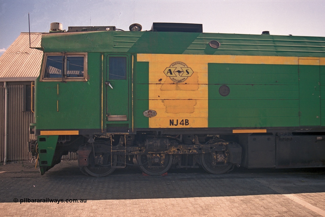 244-26
Port Lincoln loco workshops, still wearing the former owners AN livery, Australian Southern NJ class NJ 4, Clyde Engineering EMD model JL22C serial 71-731, cab side view. 6th April 2003.
Keywords: NJ-class;NJ4;Clyde-Engineering-Granville-NSW;EMD;JL22C;71-731;