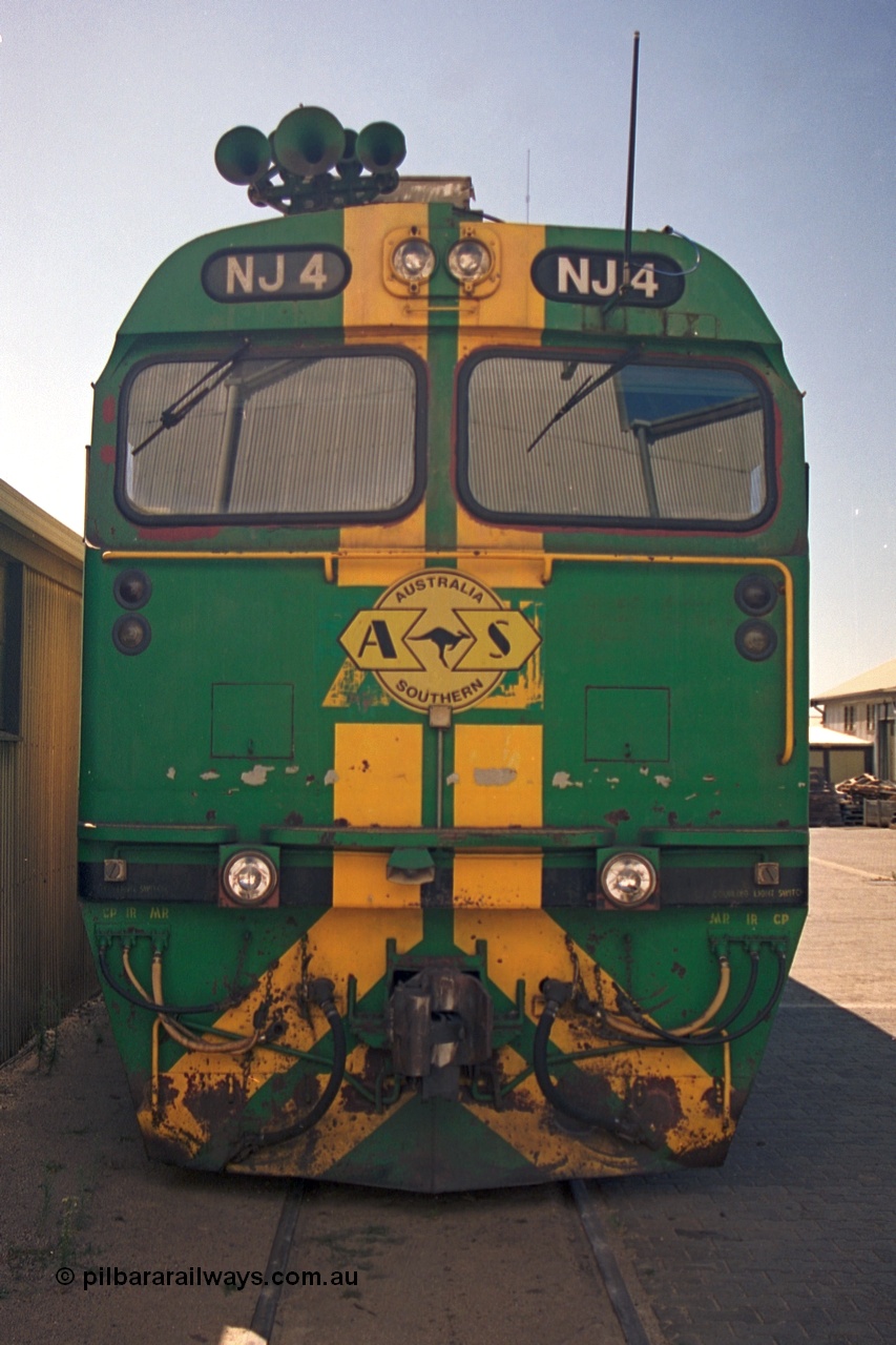 244-27
Port Lincoln loco workshops, still wearing the former owners AN livery, Australian Southern NJ class NJ 4 Clyde Engineering EMD model JL22C serial 71-731, cab front view. 6th April 2003.
Keywords: NJ-class;NJ4;Clyde-Engineering-Granville-NSW;EMD;JL22C;71-731;