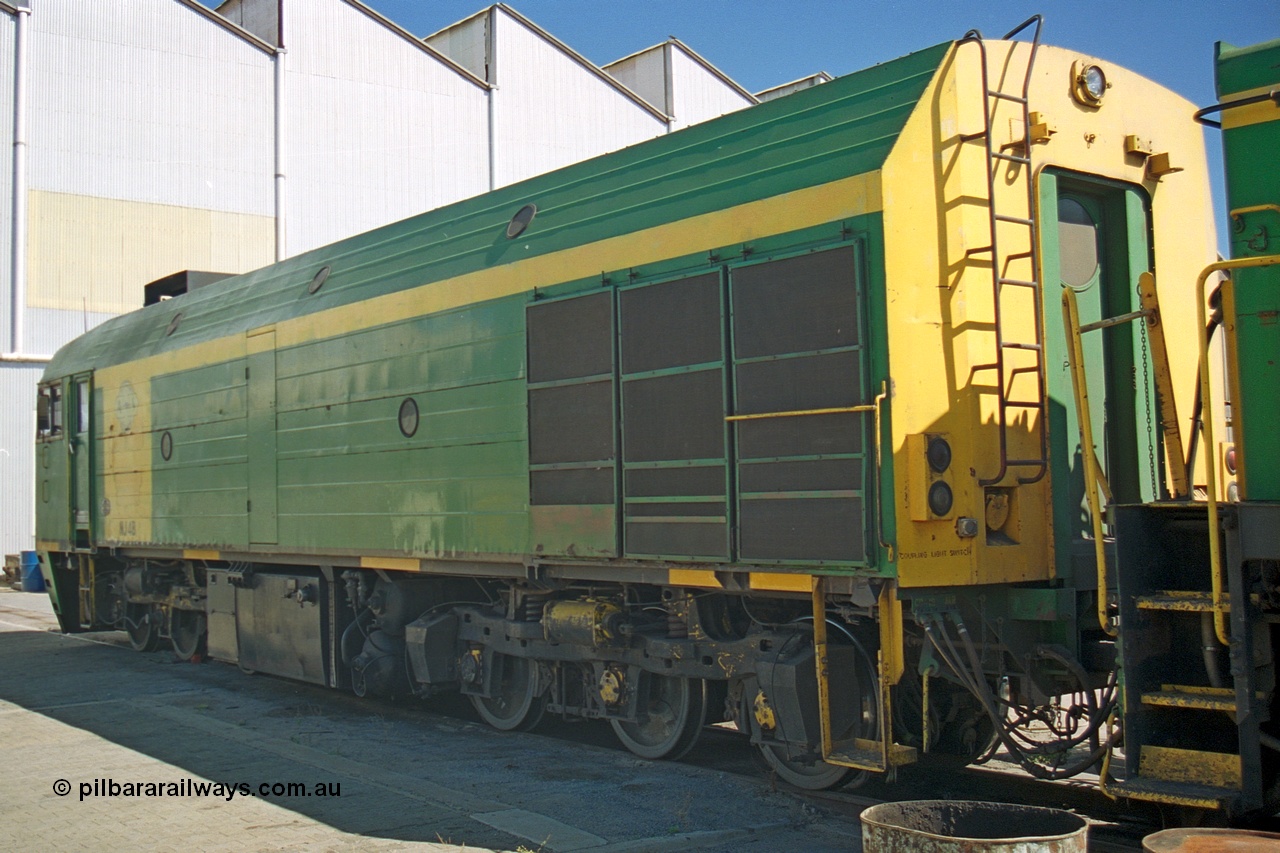 244-29
Port Lincoln loco workshops, still wearing the former owners AN livery, Australian Southern NJ class NJ 4, Clyde Engineering EMD model JL22C serial 71-731, no. 2 end roster view showing rear door and roof access ladder. 6th April 2003.
Keywords: NJ-class;NJ4;Clyde-Engineering-Granville-NSW;EMD;JL22C;71-731;