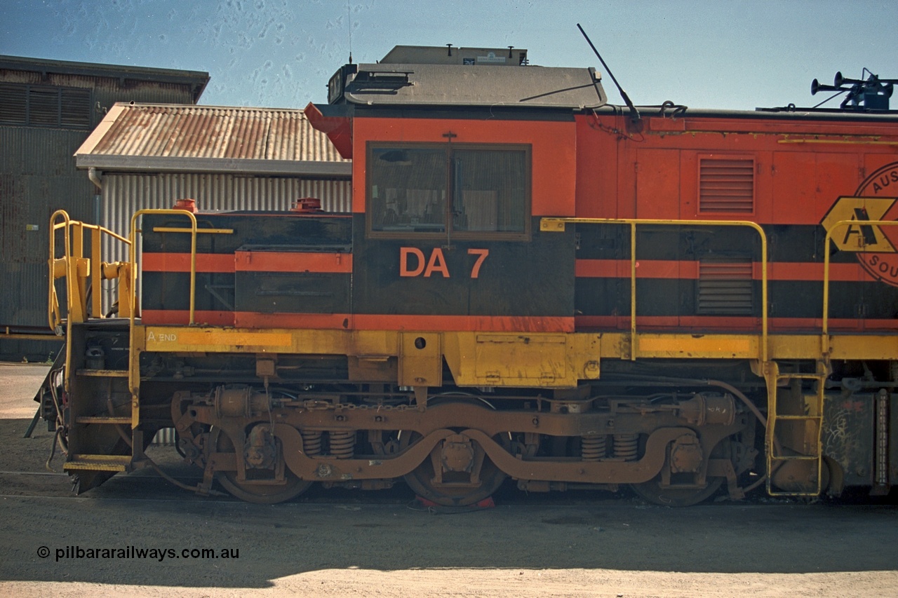 244-34
Port Lincoln loco workshops, wearing Australian Southern livery rebuild ALCo DA 7 started life as NSWGR 48 class 4813 AE Goodwin ALCo model DL531 serial 83713, rebuilt by Islington Workshops with long hood and parts from former 830 class 870 AE Goodwin ALCo model DL531 serial G6016-06 in 1998. Cab side view. 6th April 2003.
Keywords: DA-class;DA7;83713;Port-Augusta-WS;ALCo;DL531G/1;48-class;4813;rebuild;
