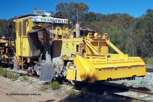 244-18
Coomunga, stabled on the siding, Transfield track machine TMN 02 ballast regulator. 6th April, 2003.
Keywords: track-machine;