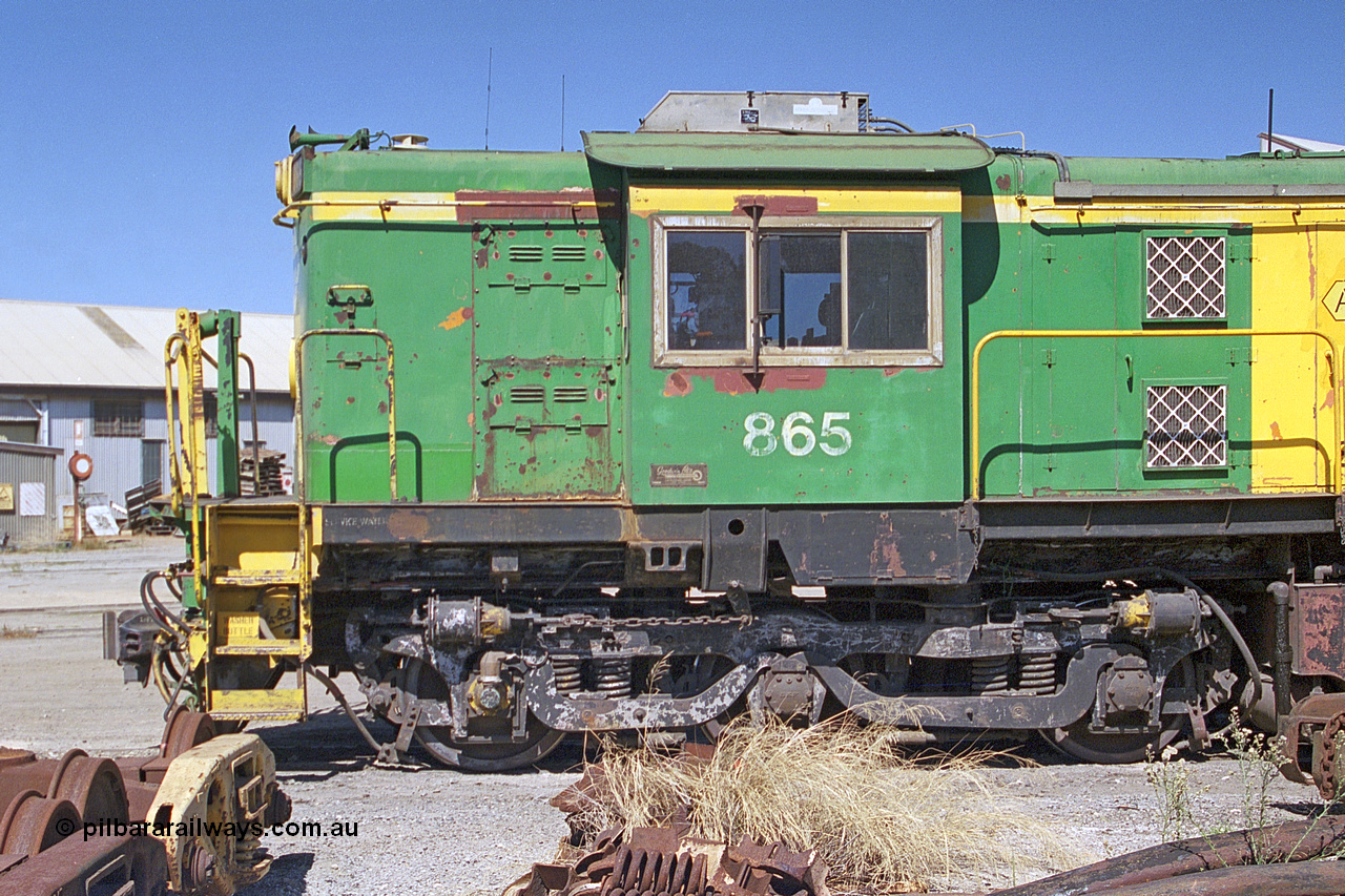 245-02
Port Lincoln loco workshops, still in former owner AN livery, Australian Southern 830 class locomotive 865 AE Goodwin ALCo model DL531 serial 84711, cab side shot. 6th April 2003.
Keywords: 830-class;865;AE-Goodwin;ALCo;DL531;84711;
