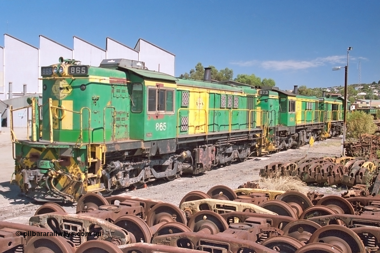 245-06
Port Lincoln loco workshops, still in former owner AN livery, Australian Southern 830 class locomotive 865 AE Goodwin ALCo model DL531 serial 84711, roster shot in multi-unit consist with sister unit 873 and DA class unit DA 6. 6th April 2003.
Keywords: 830-class;865;84711;AE-Goodwin;ALCo;DL531;