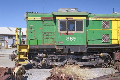 245-02
Port Lincoln loco workshops, still in former owner AN livery, Australian Southern 830 class locomotive 865 AE Goodwin ALCo model DL531 serial 84711, cab side shot. April 6, 2003.
Keywords: 830-class;865;AE-Goodwin;ALCo;DL531;84711;