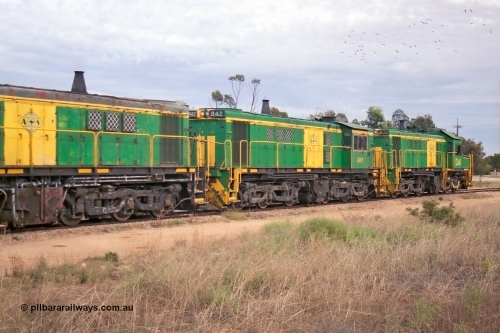 245-14
Wudinna, empty grain train shunts a rake of waggons before backing them into the grain siding, former Australian National Co-Co locomotives AE Goodwin ALCo model DL531 830 class units 842, serial no. 84140 and 851 serial no. 84137, 851 having been on the Eyre Peninsula since delivered in 1962. April 7, 2003.
Keywords: 830-class;842;AE-Goodwin;ALCo;DL531;84140;