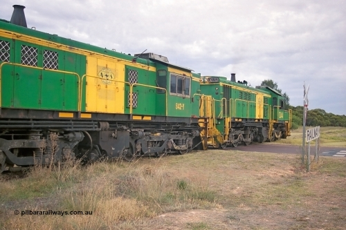 245-22
Wudinna, empty grain train shunts out of the grain siding, former Australian National Co-Co locomotives AE Goodwin ALCo model DL531 830 class units 842, serial no. 84140 and 851 serial no. 84137, 851 having been on the Eyre Peninsula since delivered in 1962. April 7, 2003.
Keywords: 830-class;842;AE-Goodwin;ALCo;DL531;84140;