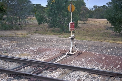 245-33
Minnipa yard, looking in the up direction at the switch stand from goods siding 2 to goods siding 3 located at the down (north) end of the yard. April 7, 2003.
