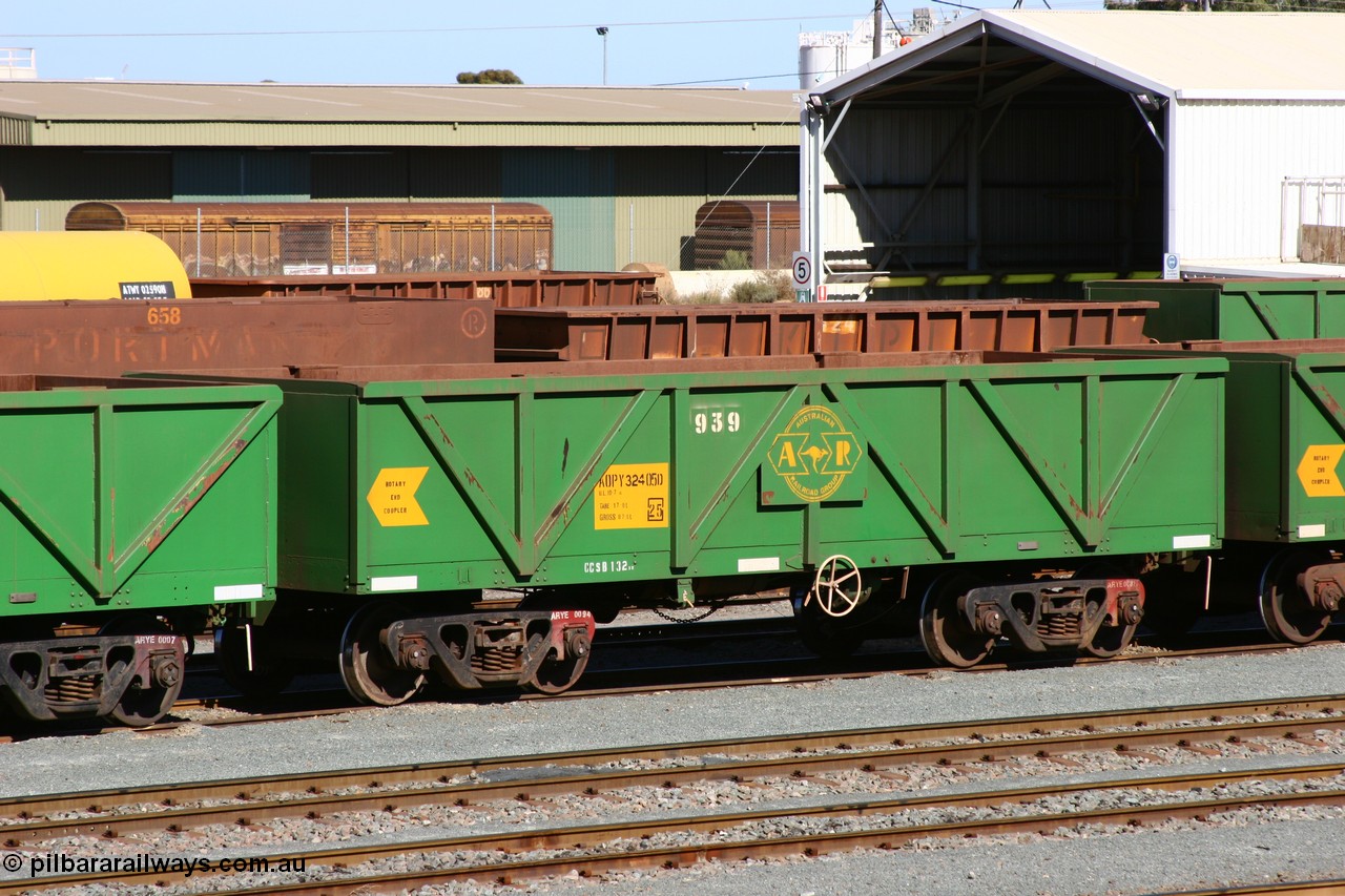 060528 4427
West Kalgoorlie, AOPY 32405, fleet number 939, one of seventy ex ANR coal waggons rebuilt from AOKF type by Bluebird Engineering SA in service with ARG on Koolyanobbing iron ore trains. They used to be three metres longer and originally built by Metropolitan Cammell Britain as GB type in 1952-55, 28th May 2006.
Keywords: AOPY-type;AOPY32405;Bluebird-Engineering-SA;Metropolitan-Cammell-Britain;GB-type;