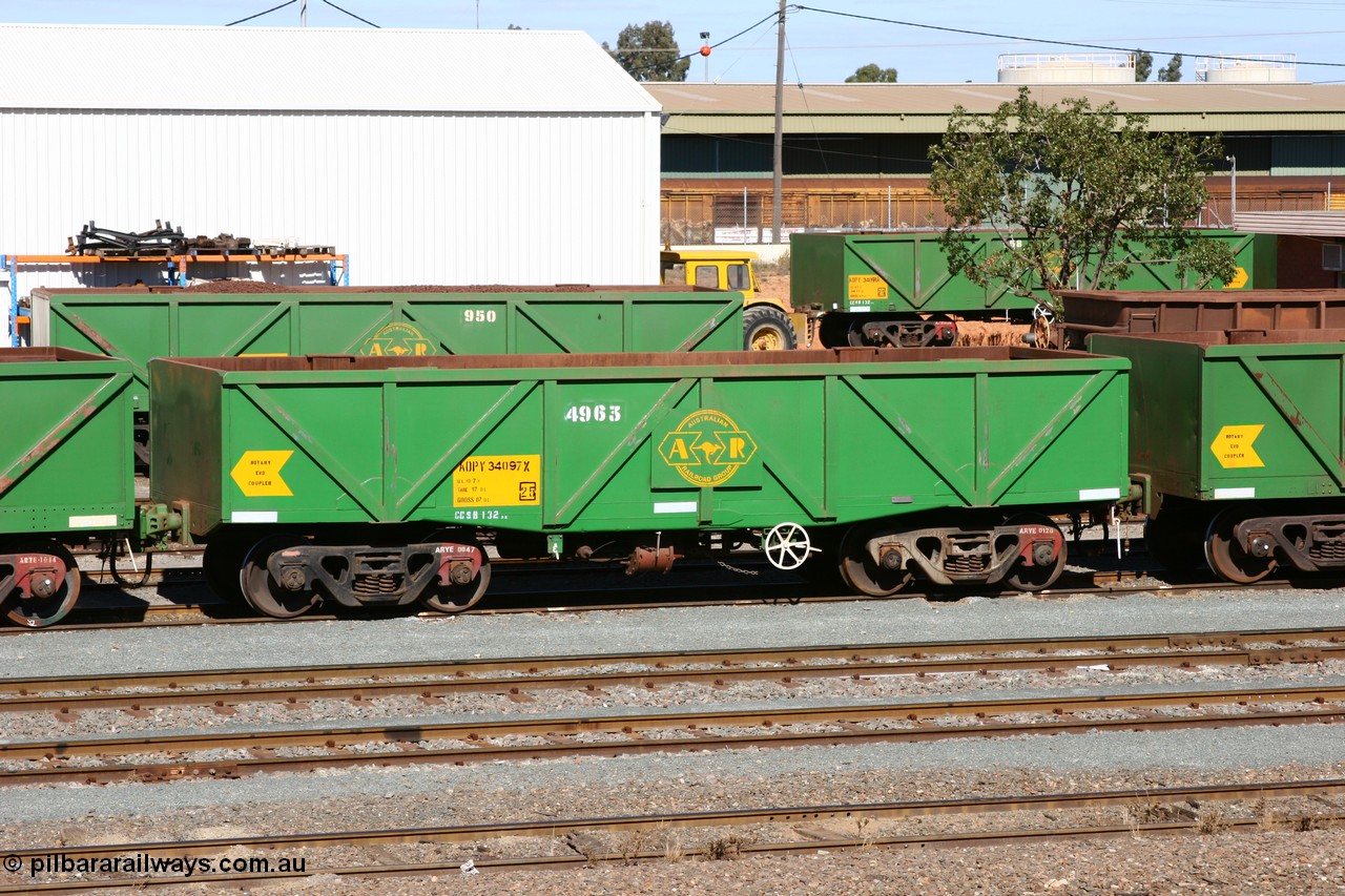 060528 4433
West Kalgoorlie, AOPY 34097, fleet number 4963, the 4 is a recent addition, is a drop floor version of one of seventy ex ANR coal waggons rebuilt from AOKF type by Bluebird Engineering SA in service with ARG on Koolyanobbing iron ore trains. They used to be three metres longer and originally built by Metropolitan Cammell Britain as GB type in 1952-55, 28th May 2006.
Keywords: AOPY-type;AOPY34097;Bluebird-Engineering-SA;Metropolitan-Cammell-Britain;GB-type;