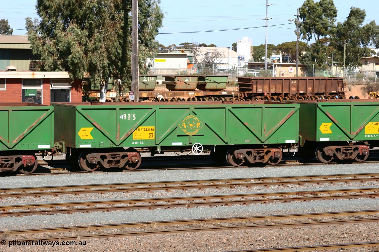 060528 4437
West Kalgoorlie, AOPY 32398, fleet number 4925 with an additional 4 added, one of seventy ex ANR coal waggons rebuilt from AOKF type by Bluebird Engineering SA in service with ARG on Koolyanobbing iron ore trains. They used to be three metres longer and originally built by Metropolitan Cammell Britain as GB type in 1952-55, 28th May 2006.
Keywords: AOPY-type;AOPY32398;Bluebird-Engineering-SA;Metropolitan-Cammell-Britain;GB-type;