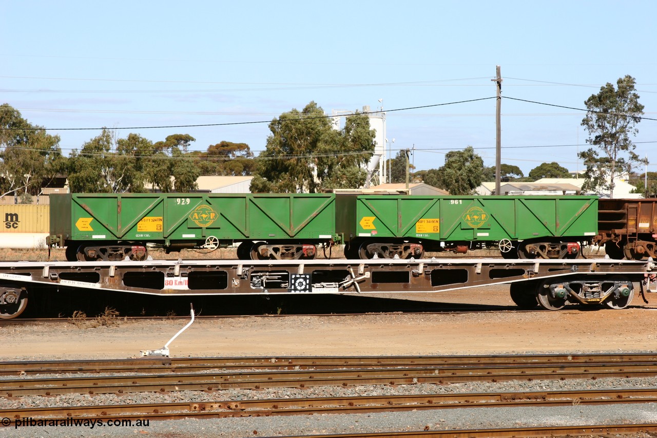 060528 4448
West Kalgoorlie, AOPY waggons 32401, fleet number 929 and 34095 with fleet number 961 and of the drop floor type, two of seventy ex ANR coal waggons rebuilt from AOKF type by Bluebird Engineering SA in service with ARG on Koolyanobbing iron ore trains. They used to be three metres longer and originally built by Metropolitan Cammell Britain as GB type in 1952-55, 28th May 2006.
Keywords: AOPY-type;AOPY32401;AOPY34095;Bluebird-Engineering-SA;Metropolitan-Cammell-Britain;GB-type;