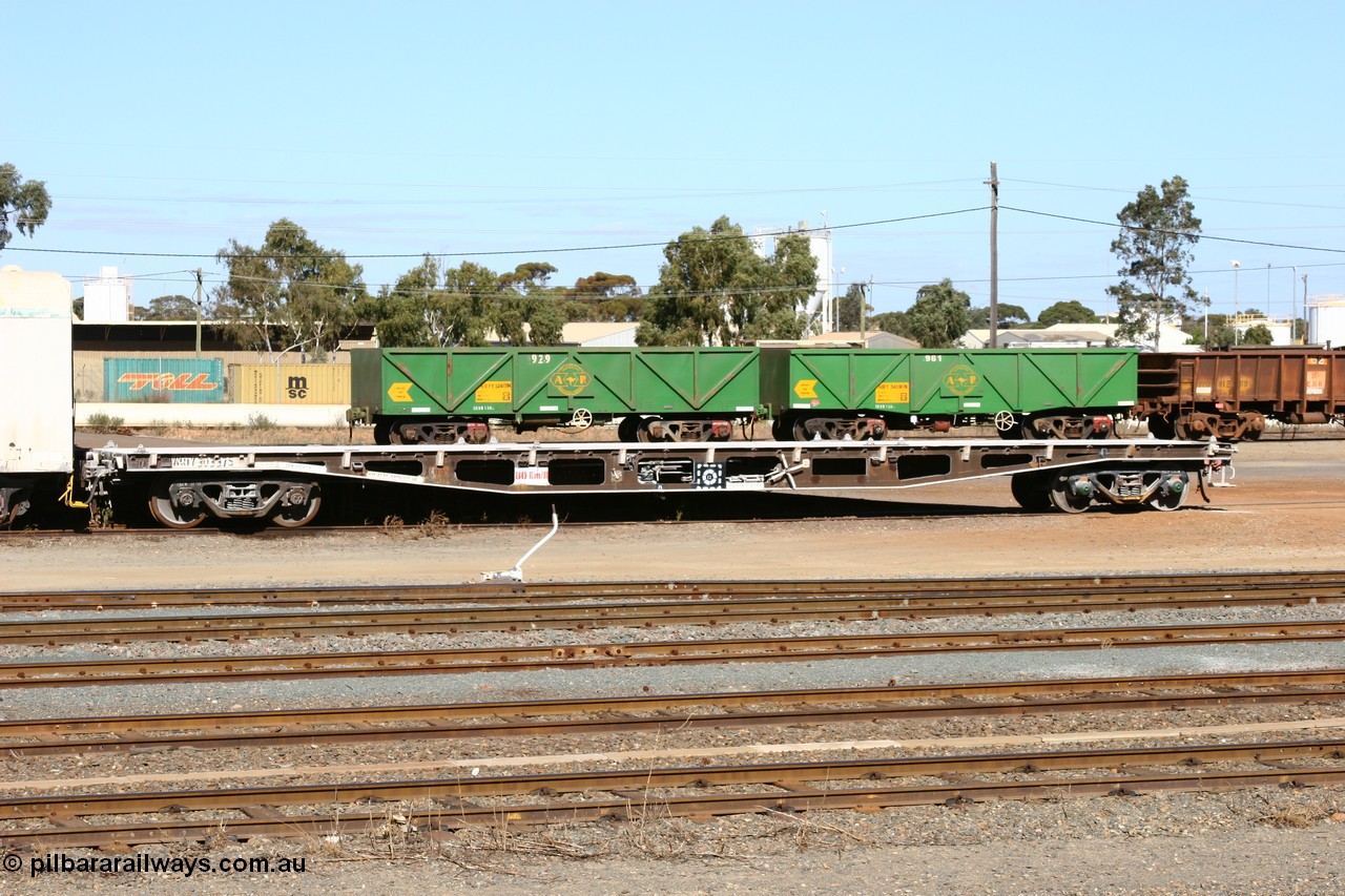 060528 4449
West Kalgoorlie, in the foreground is WQTY type flat waggon WQTY 30337 with freshly white painted side sills, built by Tomlinson Steel in 1970 in a batch of one hundred and sixty one WFX type container waggons, it went to narrow gauge at QWF in 1970 for two years, then WQCX in 1980 and WQTY in 1996, then behind that are AOPY waggons 32401 fleet number 929 and 34095 with fleet number 961 and of the drop floor type, two of seventy ex ANR coal waggons rebuilt from AOKF type by Bluebird Engineering SA in service with ARG on Koolyanobbing iron ore trains. They used to be three metres longer and originally built by Metropolitan Cammell Britain as GB type in 1952-55, 28th May 2006.
Keywords: WQTY-type;WQTY30337;Tomlinson-Steel-WA;QWF-type;WFX-type;WQCX-type;