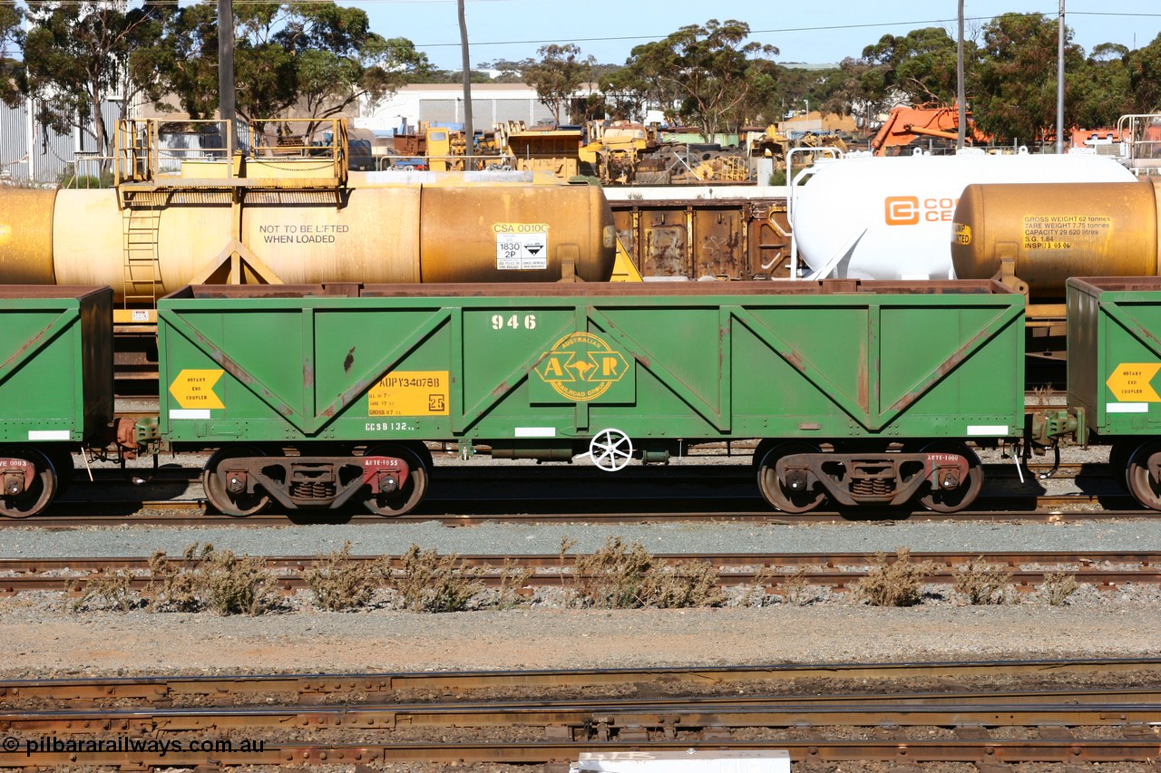 060528 4497
West Kalgoorlie, AOPY 34078 with fleet number 946, one of seventy ex ANR coal waggons rebuilt from AOKF type by Bluebird Engineering SA in service with ARG on Koolyanobbing iron ore trains. They used to be three metres longer and originally built by Metropolitan Cammell Britain as GB type in 1952-55, 28th May 2006.
Keywords: AOPY-type;AOPY34078;Bluebird-Engineering-SA;Metropolitan-Cammell-Britain;GB-type;