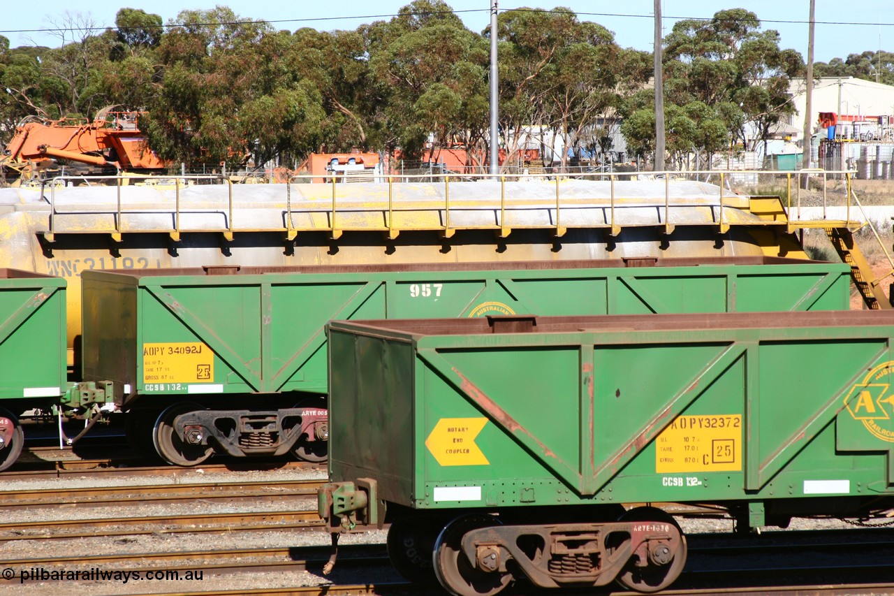 060528 4503
Part shot of West Kalgoorlie, AOPY 34092, fleet number 957 and of the drop floor type, one of seventy ex ANR coal waggons rebuilt from AOKF type by Bluebird Engineering SA in service with ARG on Koolyanobbing iron ore trains. They used to be three metres longer and originally built by Metropolitan Cammell Britain as GB type in 1952-55, 28th May 2006.
Keywords: AOPY-type;AOPY34092;Bluebird-Engineering-SA;Metropolitan-Cammell-Britain;GB-type;