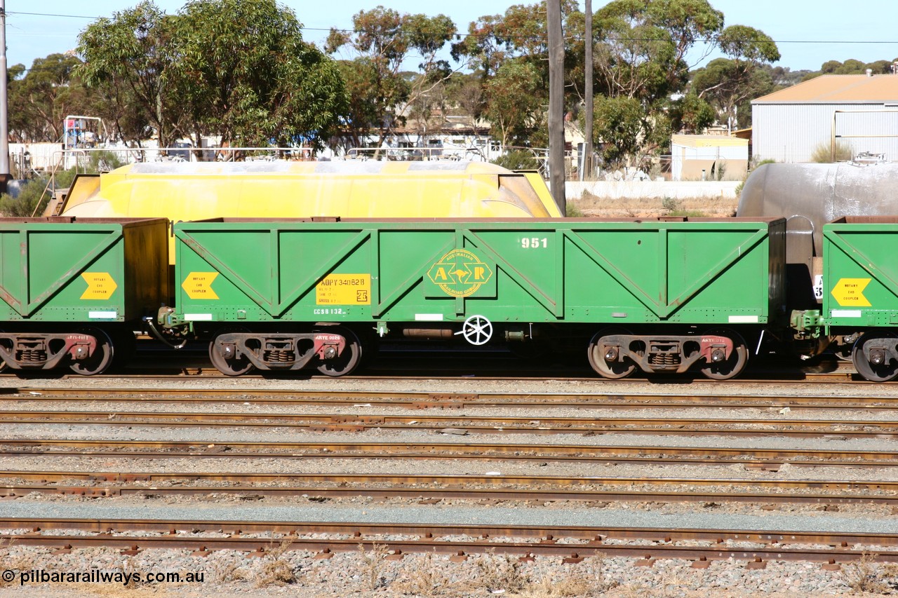 060528 4505
West Kalgoorlie, AOPY 34082, fleet number 951, one of seventy ex ANR coal waggons rebuilt from AOKF type by Bluebird Engineering SA in service with ARG on Koolyanobbing iron ore trains. They used to be three metres longer and originally built by Metropolitan Cammell Britain as GB type in 1952-55, 28th May 2006.
Keywords: AOPY-type;AOPY34082;Bluebird-Engineering-SA;Metropolitan-Cammell-Britain;GB-type;