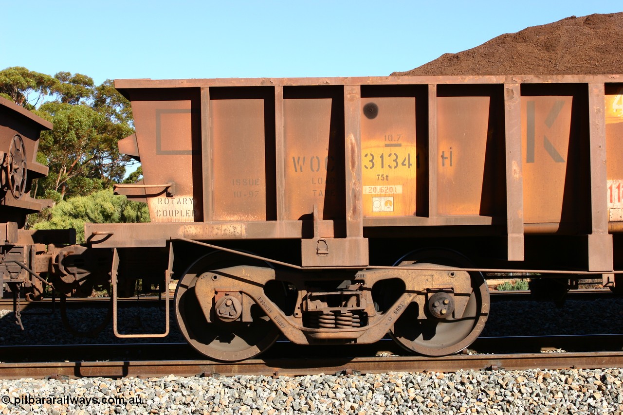 060528 4565
WOC type iron ore waggon WOC 31341 is leader of a batch of thirty built by Goninan WA between October 1997 to January 1998 with fleet number 401 for Koolyanobbing iron ore operations with a 75 ton capacity and lettered for KIPL, Koolyanobbing Iron Pty Ltd, seen here loaded with fines ore at Bonnie Vale in train number 413, 28th May 2006.
Keywords: WOC-type;WOC31341;Goninan-WA;