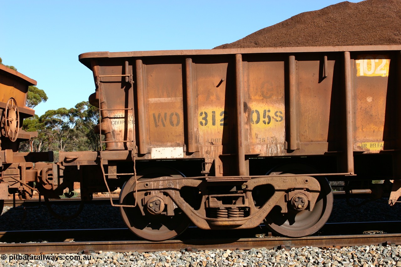 060528 4569
WO type iron ore waggon WO 31205 is one of a batch of eighty six built by WAGR Midland Workshops between 1967 and March 1968 with fleet number 102 for Koolyanobbing iron ore operations, with a 75 ton and 1018 ft.³ capacity, seen here loaded with fines at Bonnie Vale, 28th May 2006. This unit was converted to WOS superphosphate in the late 1980s till 1994 when it was re-classed back to WO.
Keywords: WO-type;WO31205;WAGR-Midland-WS;WOS-type