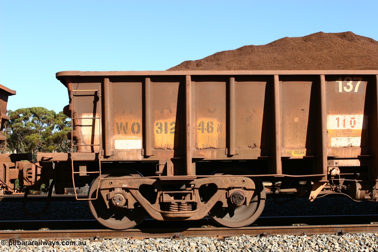 060528 4571
WO type iron ore waggon WO 31246 is one of a batch of eighty six built by WAGR Midland Workshops between 1967 and March 1968 with fleet number 137 for Koolyanobbing iron ore operations, with a 75 ton and 1018 ft³ capacity, seen here loaded with fines ore at Bonnie Vale, 28th May 2006. This unit was converted to WOC for coal in 1986 till 1994 when it was re-classed back to WO.
Keywords: WO-type;WO31246;WAGR-Midland-WS;