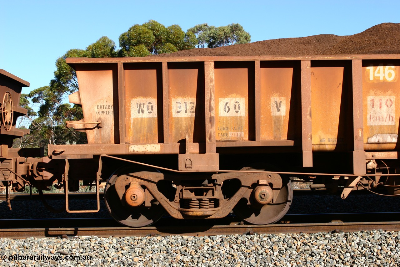 060528 4573
WO type iron ore waggon WO 31260 is one of a batch of sixty two built by Goninan WA between April and August 2000 with serial number 950086-010 and fleet number 146 for Koolyanobbing iron ore operations, and is a Goninan built replacement WO type waggon that replaces the original WAGR built WO type waggon with the newer style WOD type and has square features opposed to the curved ones as on the original WO class. Bonnie Vale, 28th May 2006.
Keywords: WO-type;WO31260;Goninan-WA;950086-010;