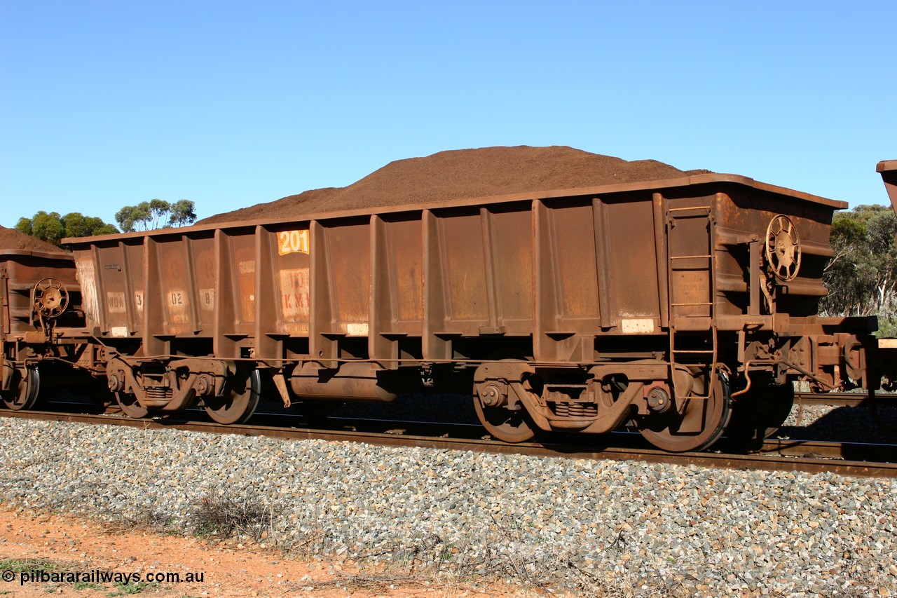 060528 4580
WOA type iron ore waggon WOA 31302 is leader of a batch of thirty nine built by WAGR Midland Workshops between 1970 and 1971 with fleet number 201 for Koolyanobbing iron ore operations, with a 75 ton and 1018 ft³ capacity, seen here with fines ore at Bonnie Vale, 28th May 2006.
Keywords: WOA-type;WOA31302;WAGR-Midland-WS;