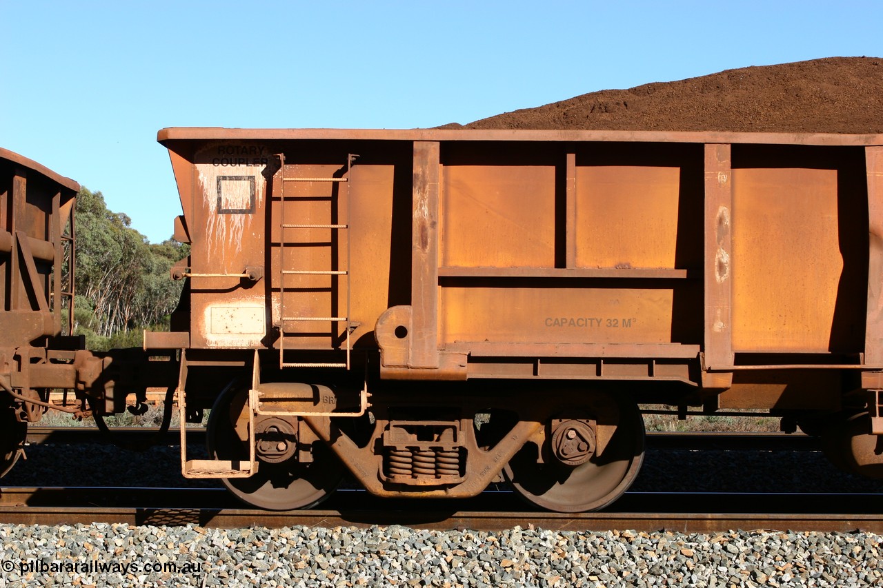060528 4583
WOB type iron ore waggon WOB 31392 is one of a batch of twenty five built by Comeng WA between 1974 and 1975 and converted from Mt Newman high sided waggons by WAGR Midland Workshops with a capacity of 67 tons with fleet number 317 for Koolyanobbing iron ore operations, this waggon was converted to a WSM ballast hopper, then converted back to a WOB by WAGR Midland Workshops, and started life as a Comeng built Mt Newman Mining ore waggon in 1974. It was originally numbered 31391 by WAGR, seen here loaded with fines at Bonnie Vale, 28th May 2006.
Keywords: WOB-type;WOB31392;Comeng-WA;WSM-type;Mt-Newman-Mining;