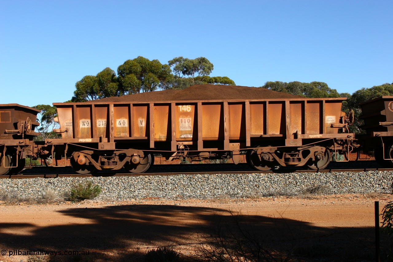 060528 4596
WO type iron ore waggon WO 31260 is one of a batch of sixty two built by Goninan WA between April and August 2000 with serial number 950086-010 and fleet number 146 for Koolyanobbing iron ore operations, and is a Goninan built replacement WO type waggon that replaces the original WAGR built WO type waggon with the newer style WOD type and has square features opposed to the curved ones as on the original WO class, seen here loaded with fines ore on train 413 at Bonnie Vale, 28th May 2006.
Keywords: WO-type;WO31260;Goninan-WA;950086-010;