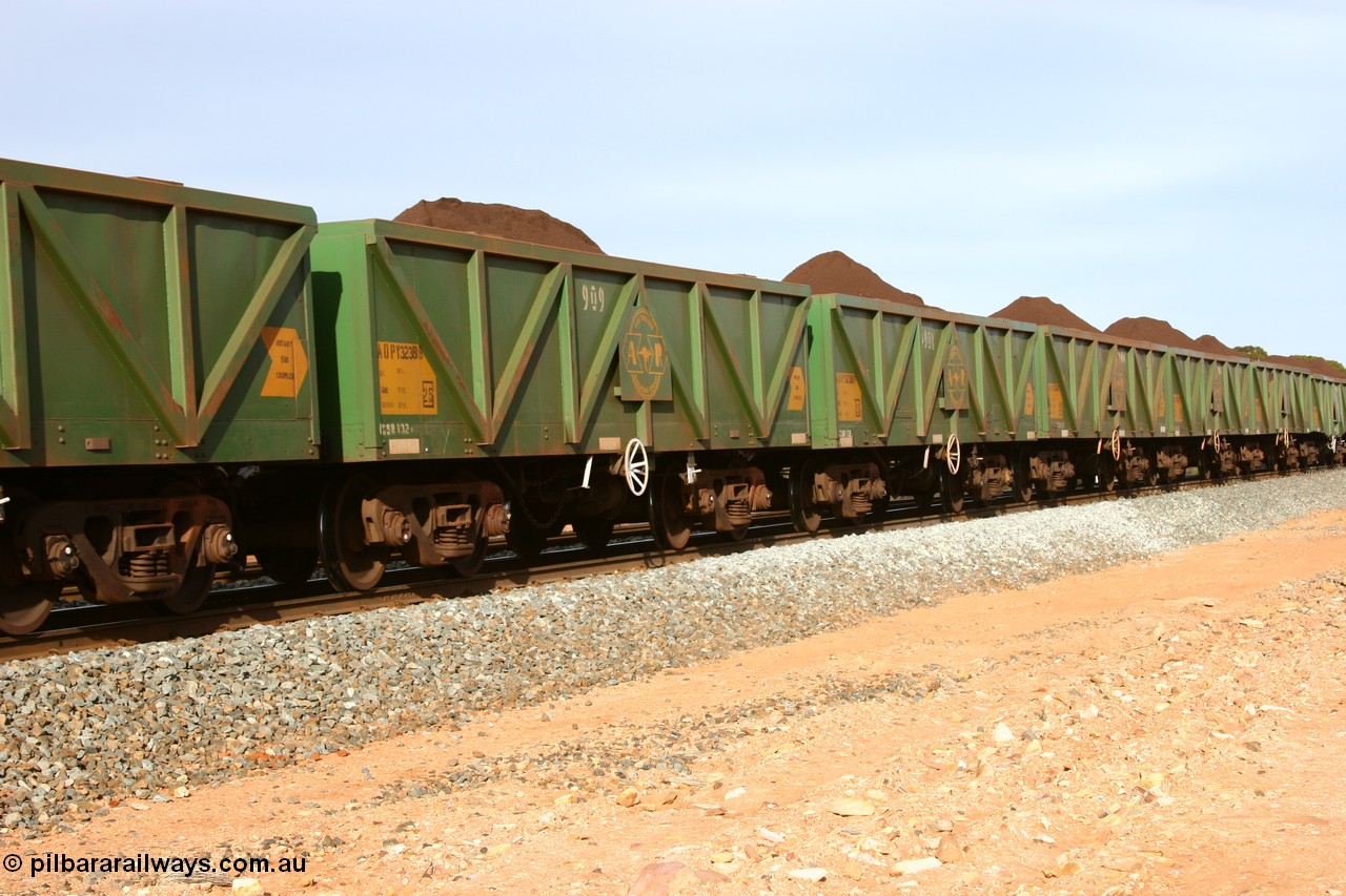 060531 5001
Binduli, AOPY 32381, fleet number 909, one of seventy ex ANR coal waggons rebuilt from AOKF type by Bluebird Engineering SA in service with ARG on Koolyanobbing iron ore trains. They used to be three metres longer and originally built by Metropolitan Cammell Britain as GB type in 1952-55, seen here in the consist with sister waggons of a loaded train, 31st May 2006.
Keywords: AOPY-type;AOPY32381;Bluebird-Engineering-SA;Metropolitan-Cammell-Britain;GB-type;