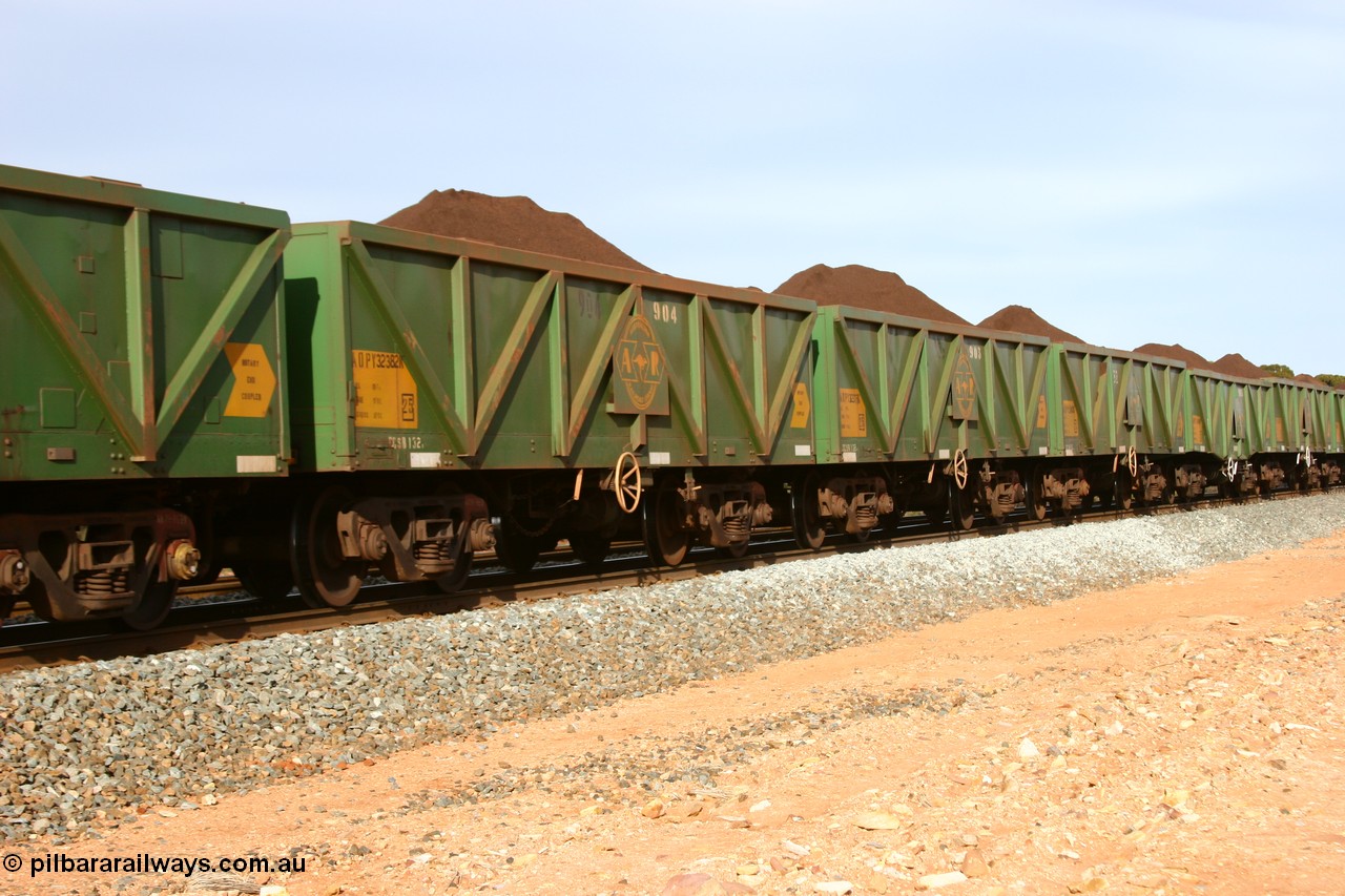 060531 5003
Binduli, AOPY 32382, with fleet number 904, one of seventy ex ANR coal waggons rebuilt from AOKF type by Bluebird Engineering SA in service with ARG on Koolyanobbing iron ore trains. They used to be three metres longer and originally built by Metropolitan Cammell Britain as GB type in 1952-55, seen here in the consist with sister waggons of a loaded train bound for West Kalgoorlie, 31st May 2006.
Keywords: AOPY-type;AOPY32382;Bluebird-Engineering-SA;Metropolitan-Cammell-Britain;GB-type;