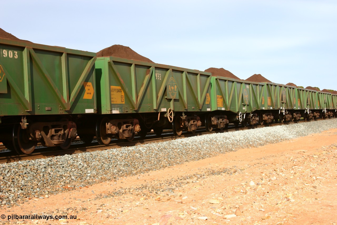 060531 5004
Binduli, AOPY 32403, with fleet number 932, one of seventy ex ANR coal waggons rebuilt from AOKF type by Bluebird Engineering SA in service with ARG on Koolyanobbing iron ore trains. They used to be three metres longer and originally built by Metropolitan Cammell Britain as GB type in 1952-55, seen here in the consist with sister waggons of a loaded train bound for West Kalgoorlie, 31st May 2006.
Keywords: AOPY-type;AOPY32403;Bluebird-Engineering-SA;Metropolitan-Cammell-Britain;GB-type;