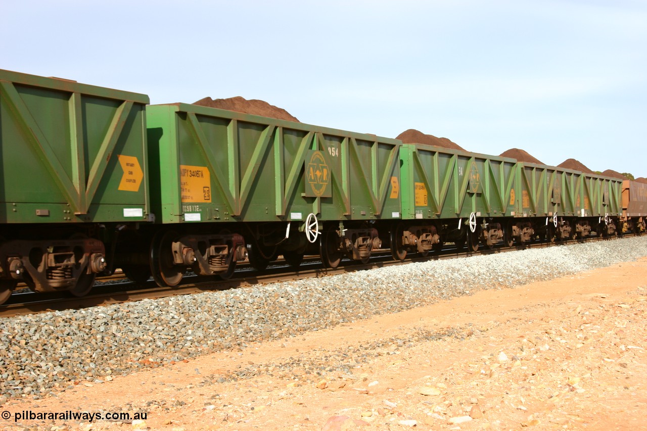 060531 5006
Binduli, AOPY 34087, fleet number 954, one of seventy ex ANR coal waggons rebuilt from AOKF type by Bluebird Engineering SA in service with ARG on Koolyanobbing iron ore trains. They used to be three metres longer and originally built by Metropolitan Cammell Britain as GB type in 1952-55, seen here in the consist with sister waggons of a loaded train bound for West Kalgoorlie, 31st May 2006.
Keywords: AOPY-type;AOPY34087;Bluebird-Engineering-SA;Metropolitan-Cammell-Britain;GB-type;