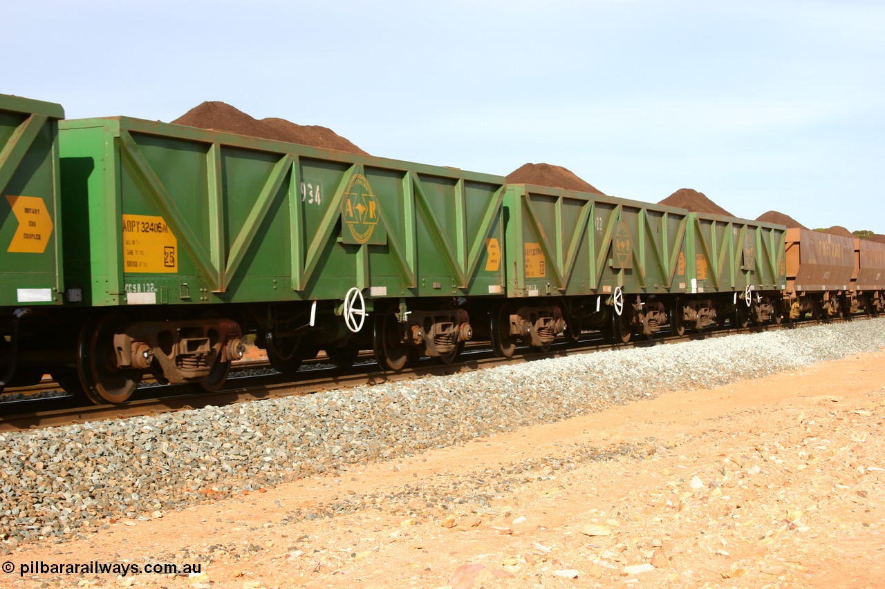 060531 5007
Binduli, AOPY 32406, fleet number 934, one of seventy ex ANR coal waggons rebuilt from AOKF type by Bluebird Engineering SA in service with ARG on Koolyanobbing iron ore trains. They used to be three metres longer and originally built by Metropolitan Cammell Britain as GB type in 1952-55, seen here in the consist with sister waggons of a loaded train bound for West Kalgoorlie, 31st May 2006.
Keywords: AOPY-type;AOPY32406;Bluebird-Engineering-SA;Metropolitan-Cammell-Britain;GB-type;