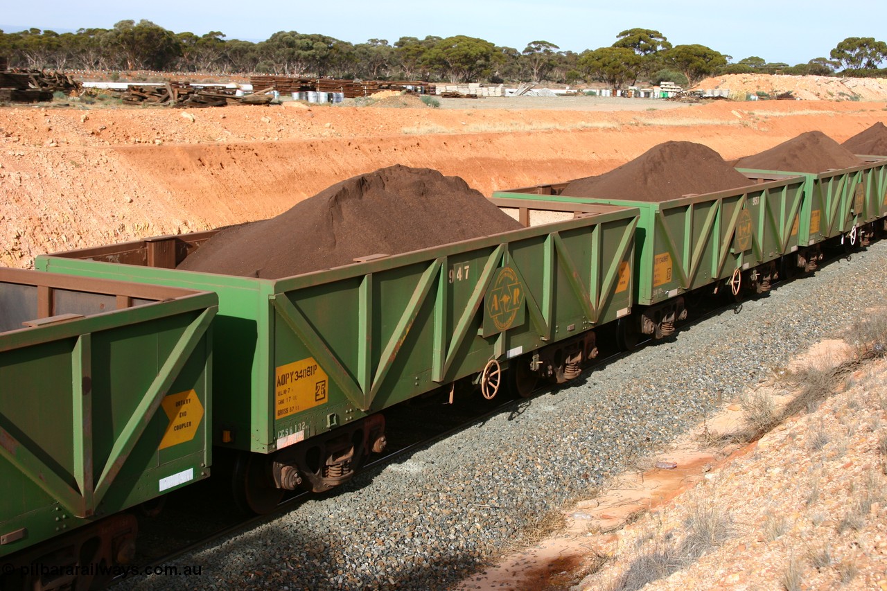 060531 5023
West Kalgoorlie, AOPY 34081 with fleet number 947, one of seventy ex ANR coal waggons rebuilt from AOKF type by Bluebird Engineering SA in service with ARG on Koolyanobbing iron ore trains. They used to be three metres longer and originally built by Metropolitan Cammell Britain as GB type in 1952-55, 31st May 2006.
Keywords: AOPY-type;AOPY34081;Bluebird-Engineering-SA;Metropolitan-Cammell-Britain;GB-type;